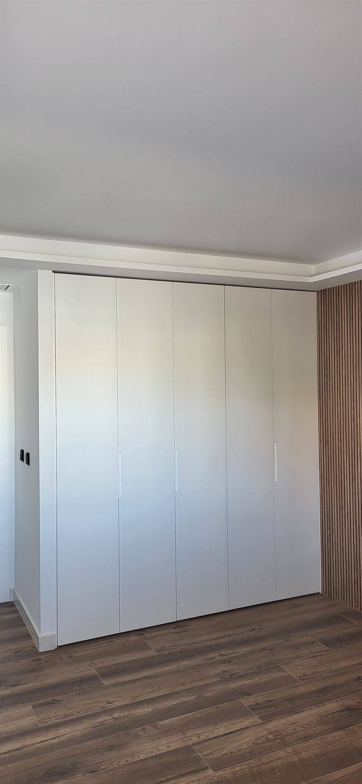 Vivienda reformada con tarima de madera